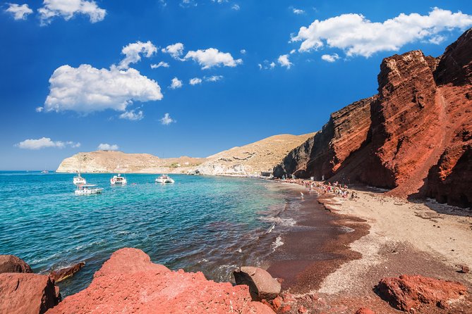 Archaeological Bus Tour To Akrotiri Excavations & Red Beach - Walking through Akrotiri Excavations