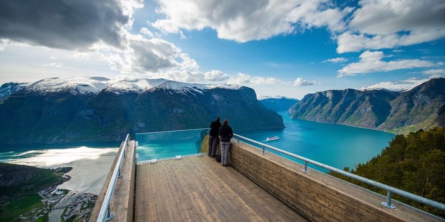 Bergen: Nærøyfjorden, Flåm, and Stegastein Guided Bus Tour - Tvindefossen starts the scenic run