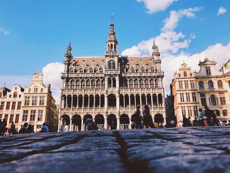 Brussels Highlights: Walking & Bus Tour with Waffle Tasting - Grand Place, Brussels in one dramatic square