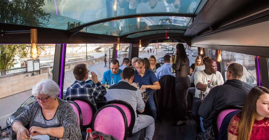 Bus Toqué Champs Elysées Tour w/ 3-Course Dinner & Champagne - Eating a three-course seasonal dinner on the bus