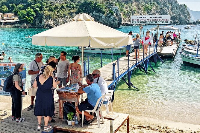 Bus Trip with Swim to Paleokastritsa and Olive Oil Museum - Guides, transport, and the shape of the day