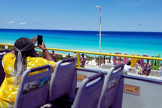 Cancun City Tour by Downtown and Turistic Hightlights on Open Bus - Playa Delfines and the famous Cancun sign