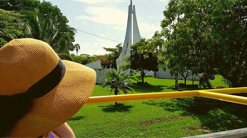 Cancun: Guided City Tour with Shopping by Double Decker Bus - Plaza La Fiesta mixes tequila, candy, and shopping