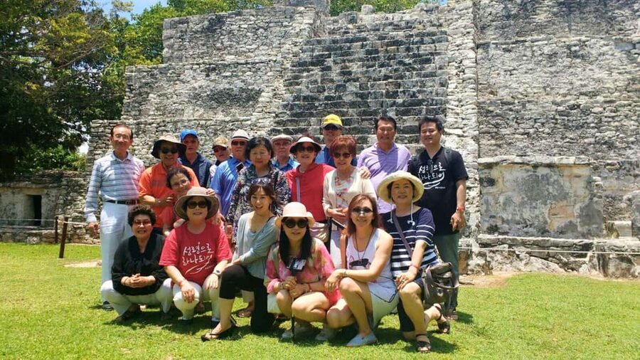 Cancun: Guided City Tour with Shopping by Double Decker Bus - Plaza 28 shows you downtown Cancun