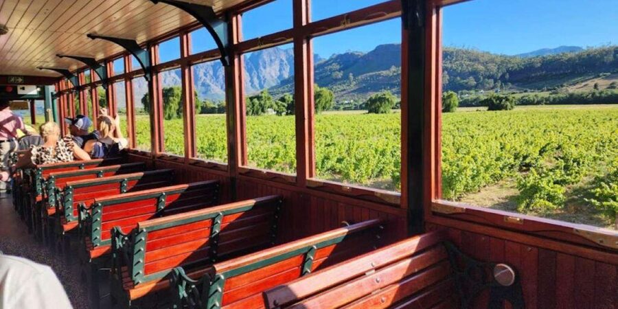Cape Town: Hop On, Hop Off: Franschhoek Wine Tram Tour! - Wine tastings, cellar tours, and lunch costs