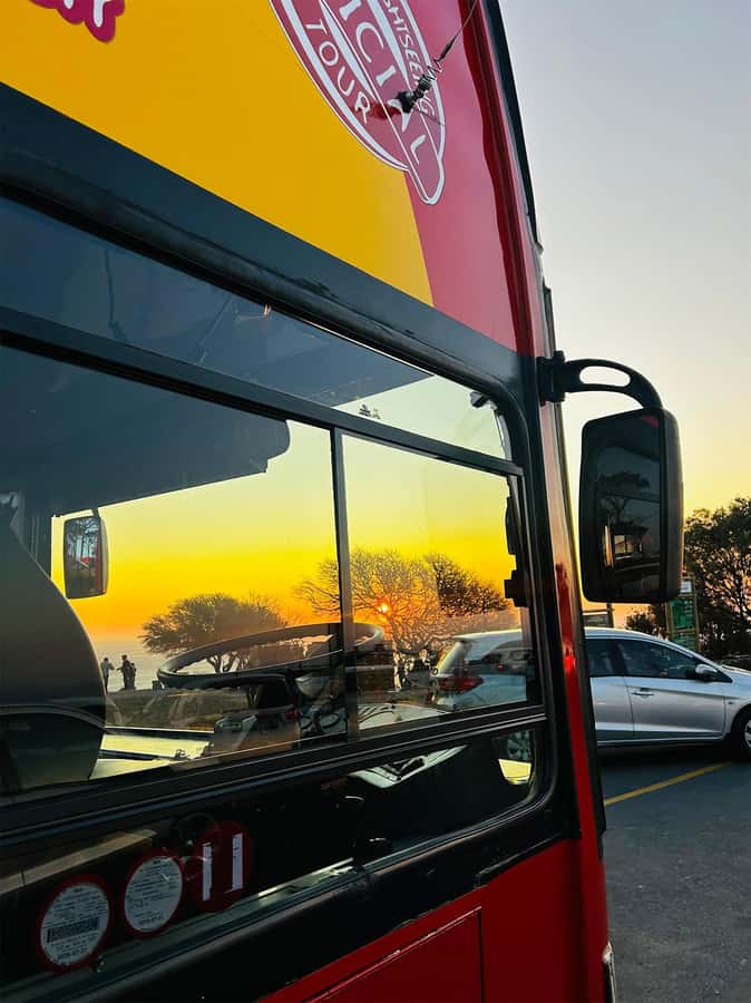 Cape Town: Sunset Bus Tour with Picnic on Signal Hill - Returning to the V&A Waterfront after dark