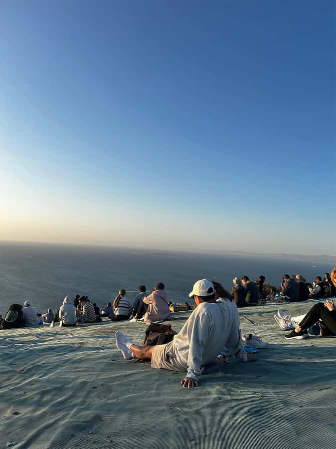 Cape Town: Sunset Bus Tour with Picnic on Signal Hill - Following the Atlantic Seaboard through Sea Point and Camps Bay