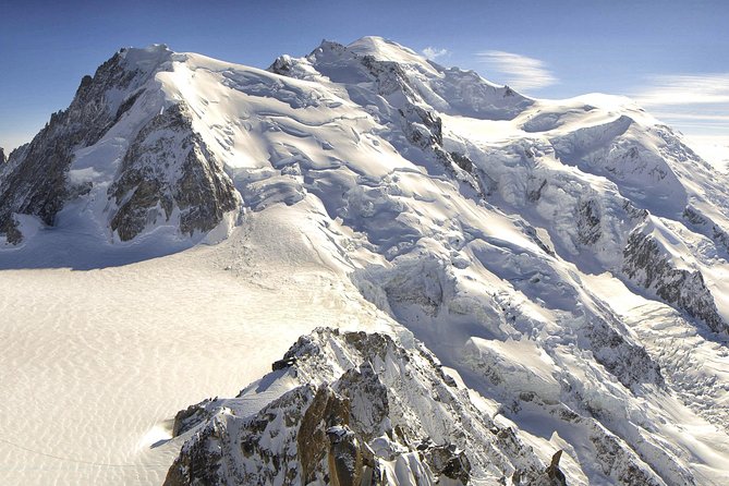 Chamonix & Mont Blanc Panoramic Sky-Glass Bus Guided Day Trip - Chamonix town and its mountaineering story