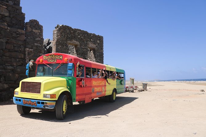 Colorful Beach Bus Sightseeing Tour of Aruba - Aruba sightseeing with a party-bus feel