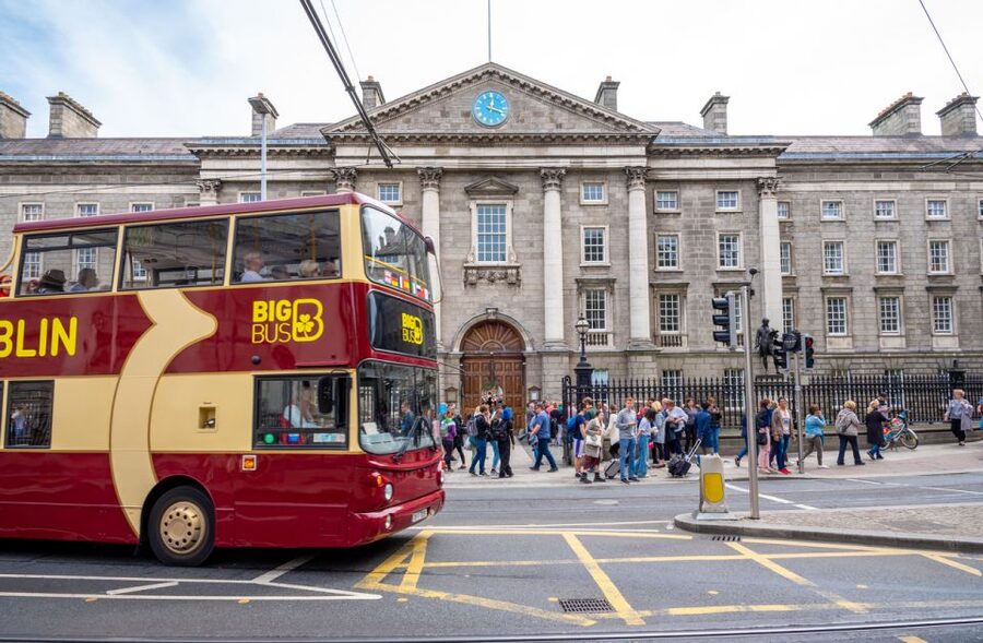 Dublin: Jameson Whiskey Distillery & Hop-on Hop-off Bus Tour - Reading Dublin from the open-top bus