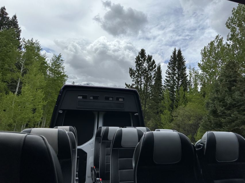 Estes Park: Rocky Mountain National Park Glass-Top Bus Tour - Waterfalls, snowmelt, and wildlife stops