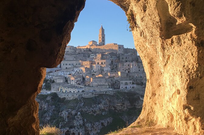 FAST TO MATERA: Guided Tour with bus, from Bari - Entering the Sassi with a local guide