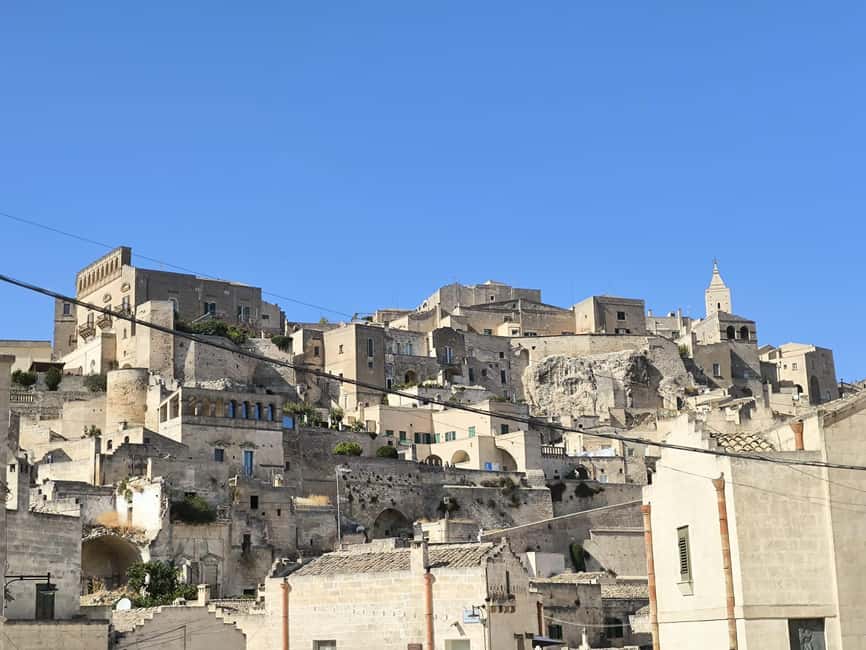From Bari: Matera Day Trip with Guided Bus Tour - Entering the Sassi with a local guide