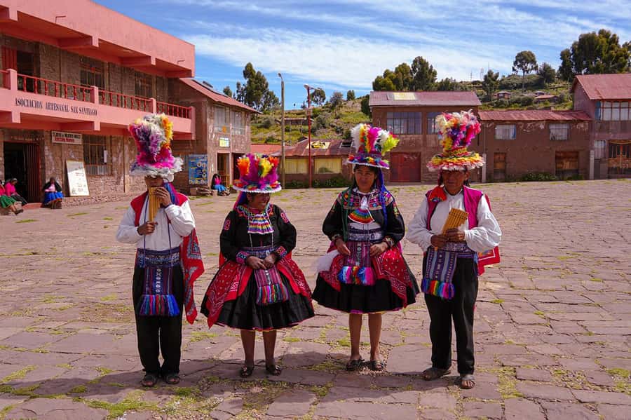 From Cusco: Titicaca Lake - Full day tour with sleeper bus - Lunch with a local family