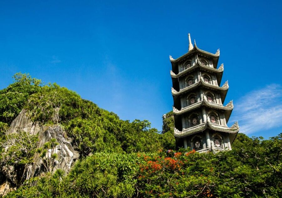 From Danang: Da Nang Sightseeing Bus City Tour - Marble Mountains: caves, steps, and an early start