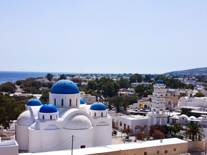 From Fira: Santorini Highlights Minibus Tour with Oia Sunset - Red Beach is a quick but striking photo stop