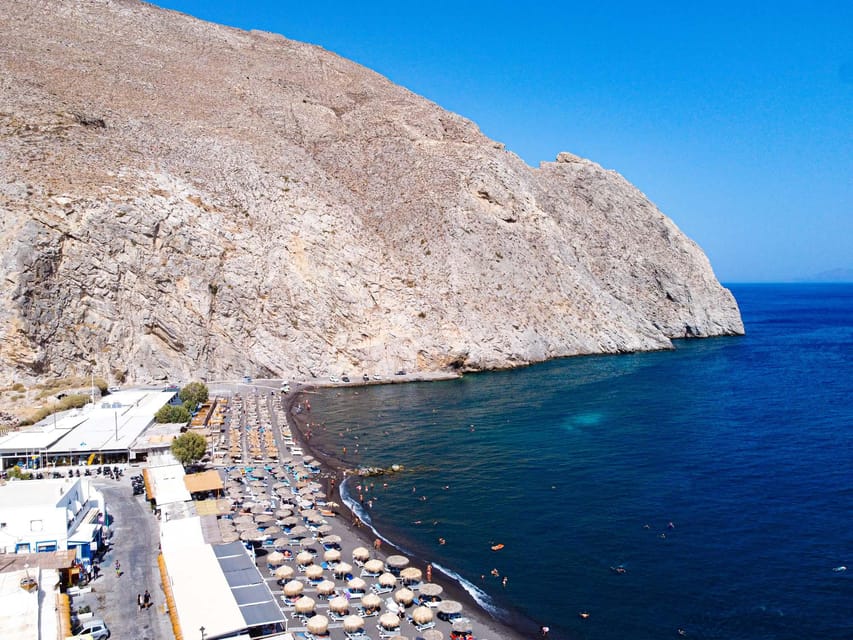 From Fira: Santorini Highlights Minibus Tour with Oia Sunset - Firostefani supplies the blue-domed image