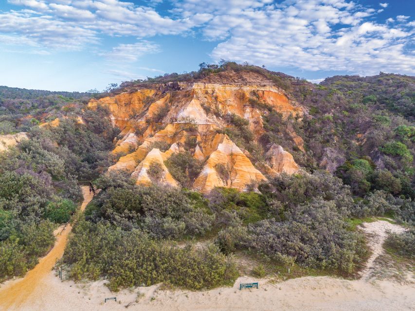 From Hervey Bay: K'gari, Fraser Island Two-Day Coach Tour - Eli Creek and the Maheno shipwreck bring variety