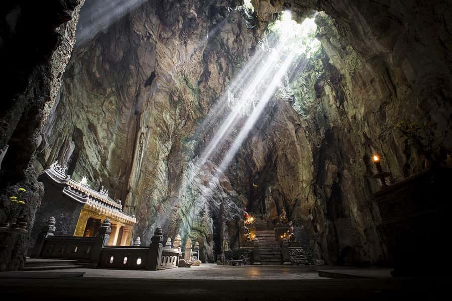 From Hue: Hoi An Guided Bus Tour with 4 Scenic Stops - Marble Mountains: caves, temples, and a short climb