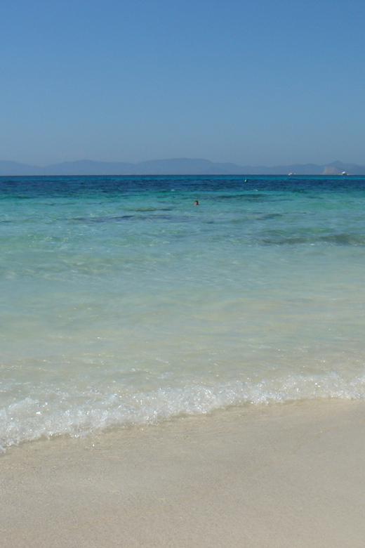 From Ibiza: Ferry and Guided Bus Excursion in Formentera - Es Pujols or Mitjorn for swimming and lunch