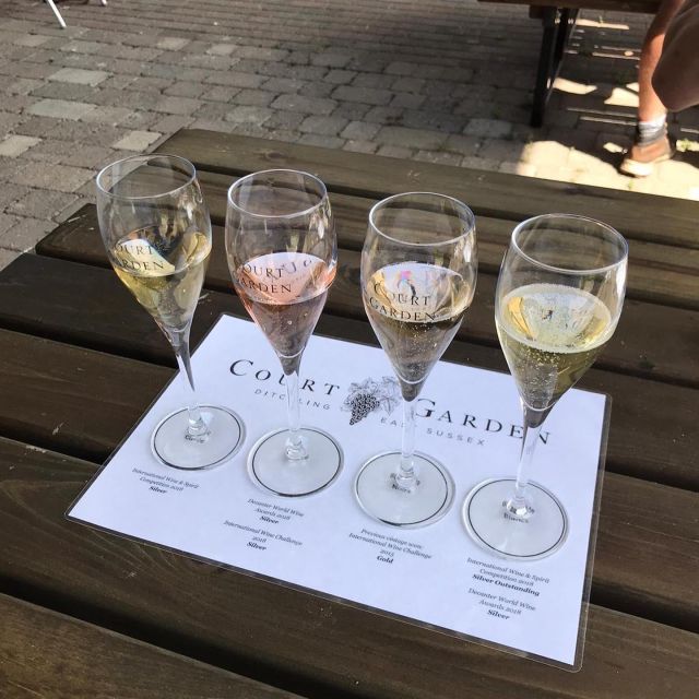 From London: Vintage Bus Wine Tour with Return Train Tickets - The first vineyard combines lunch and winemaking