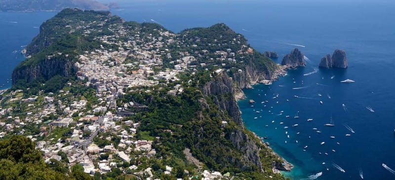 From Naples: Complete Capri Guided Boat and Bus Tour - The ferry from Naples takes about one hour