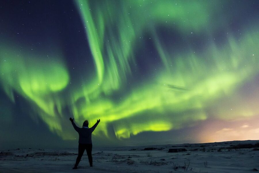 From Reykjavik: Northern Lights Bus Tour with Hot Cocoa - Leaving Reykjavík for a darker sky