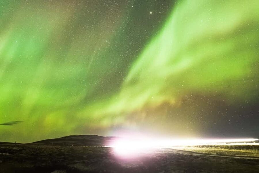 From Reykjavik: Northern Lights Bus Tour with Hot Cocoa - Photography: bring the right expectations