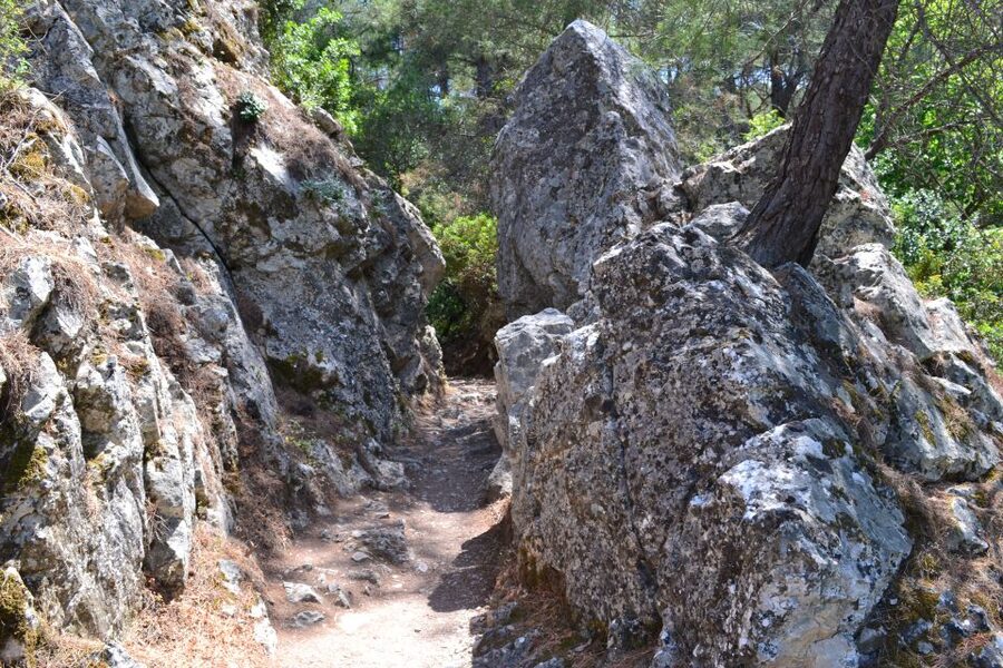 From Rhodes: Lindos and 7 Springs Valley Bus Tour - Walking the dark tunnel