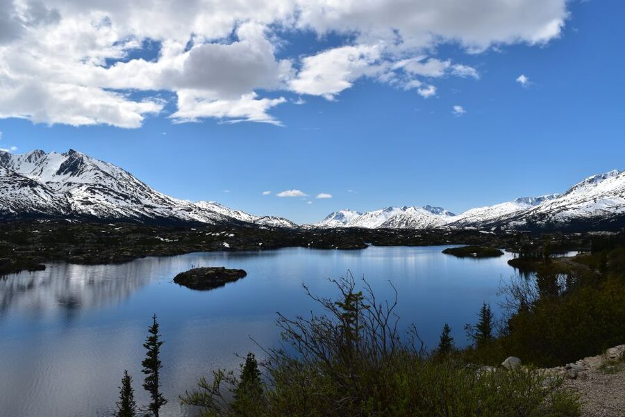 From Skagway: White Pass Summit Guided Bus Tour - Captain William Moore Bridge and the road’s modern edge