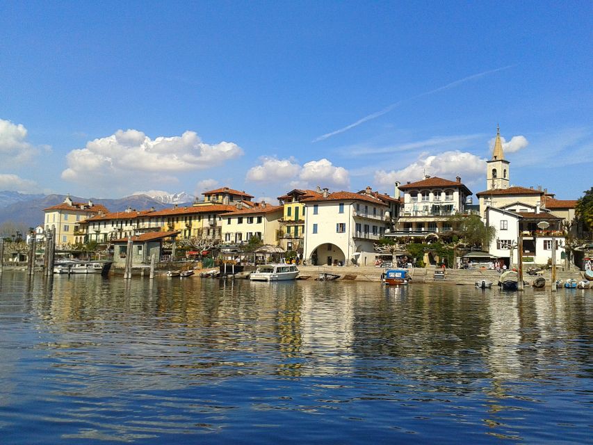 From Stresa: Isola Pescatori Hop-On Hop-Off Boat Tour - Eating lake specialties on a restaurant terrace