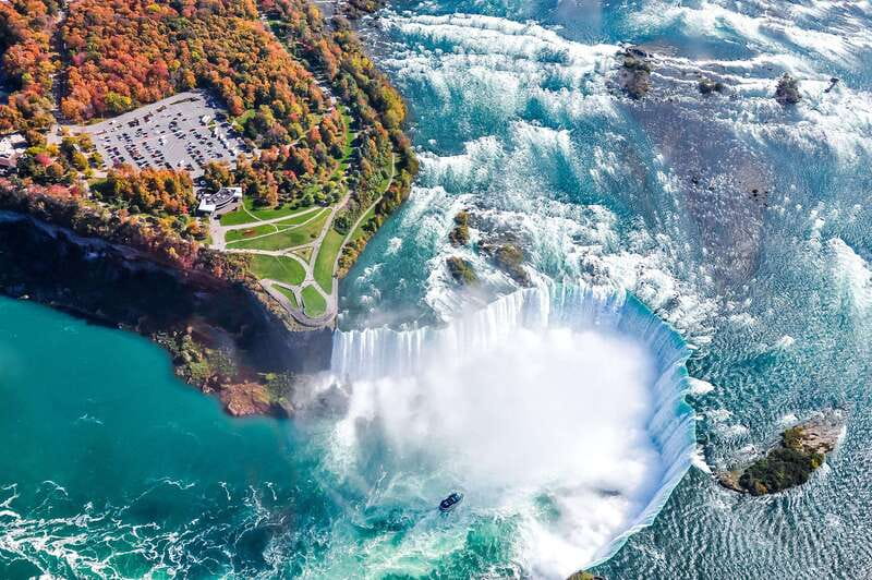 From Toronto: Niagara Falls Bus Tour with Boat Cruise - The Hornblower cruise and the mist