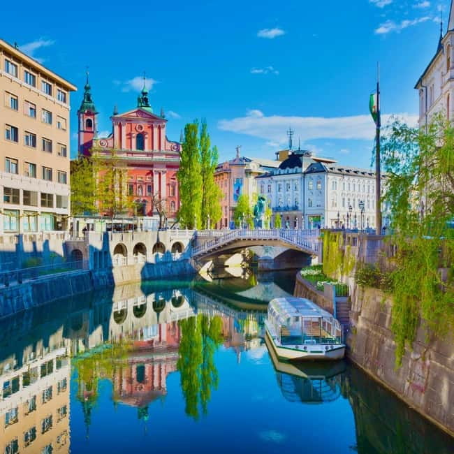 From Trieste: Ljubljana and Lake Bled Full-Day Bus Tour - Ljubljana along the Ljubljanica River