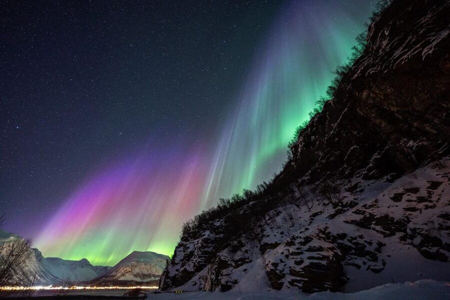 From Tromsø: Aurora Minibus Chase with Portrait and Hot Meal - Setting up camp beside a lake, bay, or beach