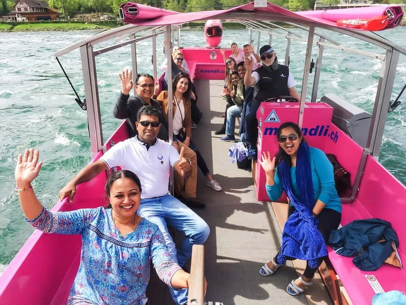 From Zurich: Rhine Falls Coach Tour with Entry Tickets - The optional boat ride toward the spray