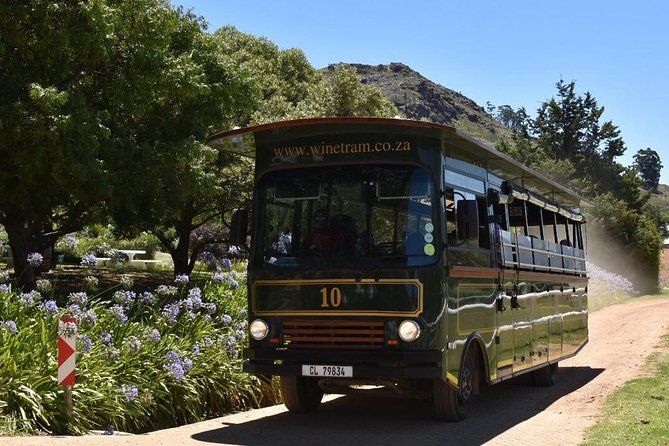 Full-Day Franschhoek Hop On Hop Off Wine Tram Tour from Cape Town - Wine, gin, cheese, and lunch costs