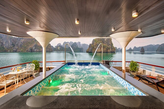 Full Day Halong Bay Luxury Limousine Bus & Buffet Lunch - Boarding the boat and settling in with lunch