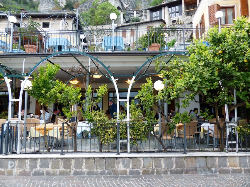 Full-Day Lake Garda Tour: Bus & Public Boat with Guide - Friday route: Sirmione, Limone, and Malcesine