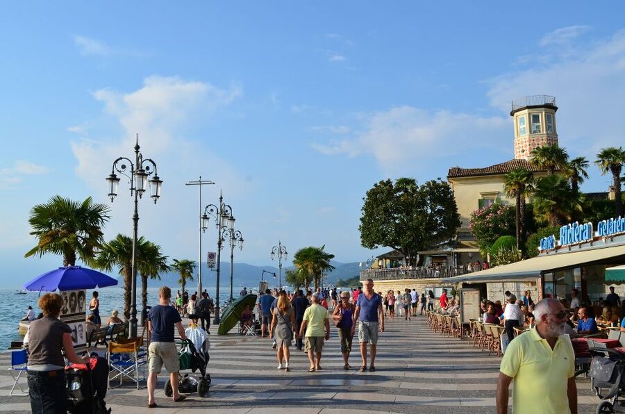 Full-Day Lake Garda Tour: Bus & Public Boat with Guide - The coach, guide, and pace of the day