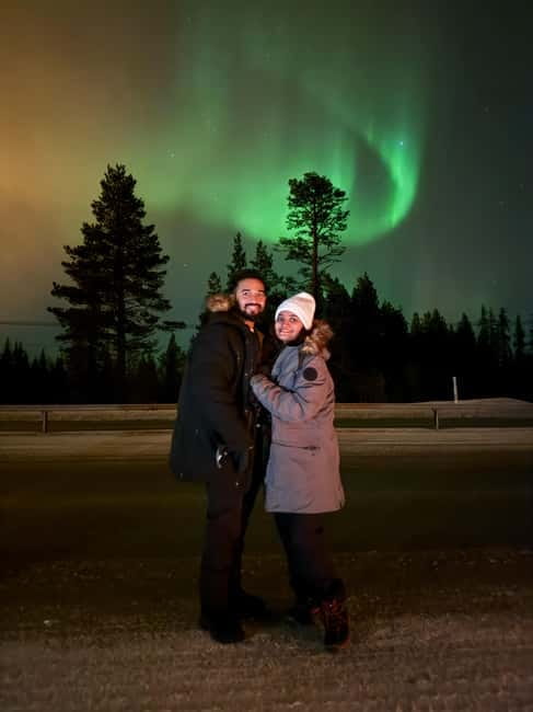 Guarantee Northern Lights Hunt by Minibus With Local Guide - Waiting under blankets for the sky to change