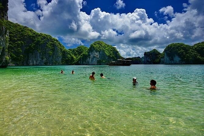 Ha Long Bay Day Cruise, Cave, Kayaking, Swimming, Bus & Lunch - Inside Sung Sot Cave, the bay’s most theatrical stop