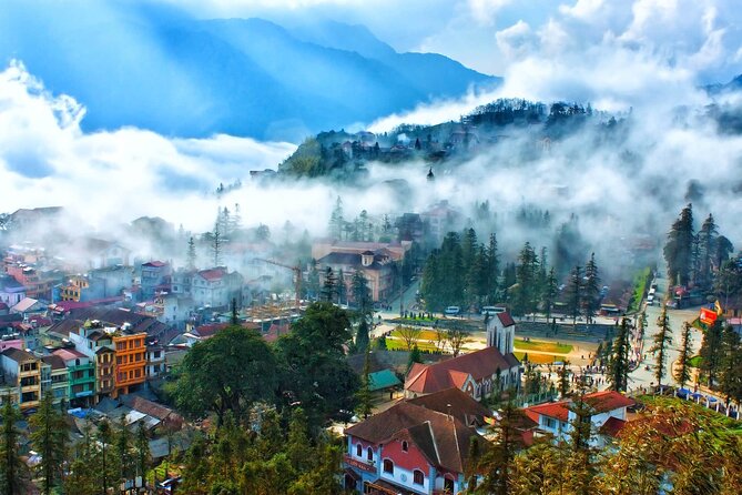Hanoi to Fansipan Peak 2-Day Bus Tour plus Lodging, Meals, and Pickup - Riding the cable car toward Fansipan