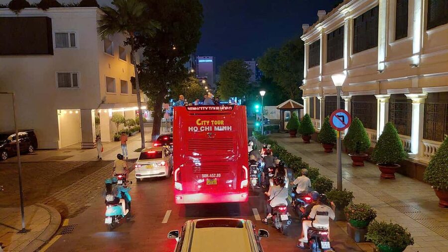 Ho Chi Minh City: Late-Night Open-Top Bus Tour - No standard audio guide, so bring your own context