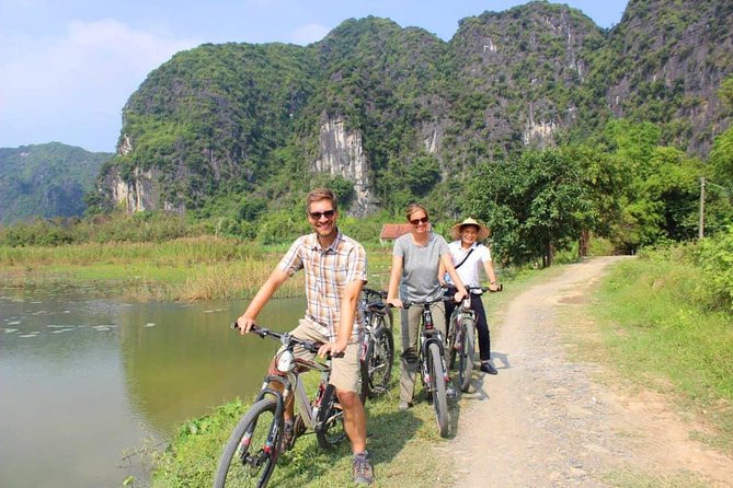 Hoa Lu - Tam Coc Luxury Small group 1D: Limousine bus, biking, boat trip, Lunch - Tam Coc by sampan boat