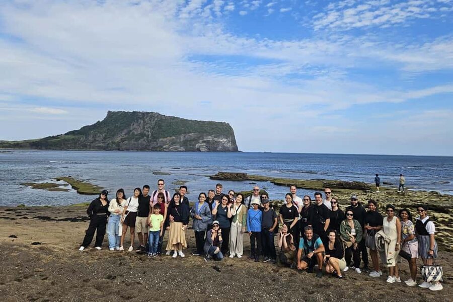 Jeju Island: Full-Day East Jeju Bus Tour with Entry Fees - What the guide adds to the day