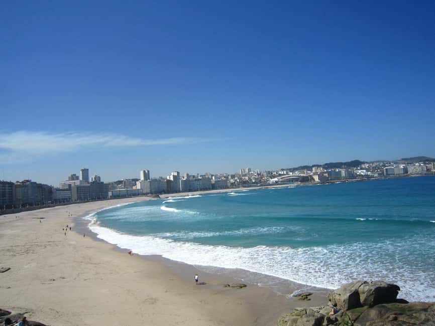 La Coruna: Sightseeing Bus Tour for Cruisers - The glass-fronted Marine Avenue and San Antón Castle