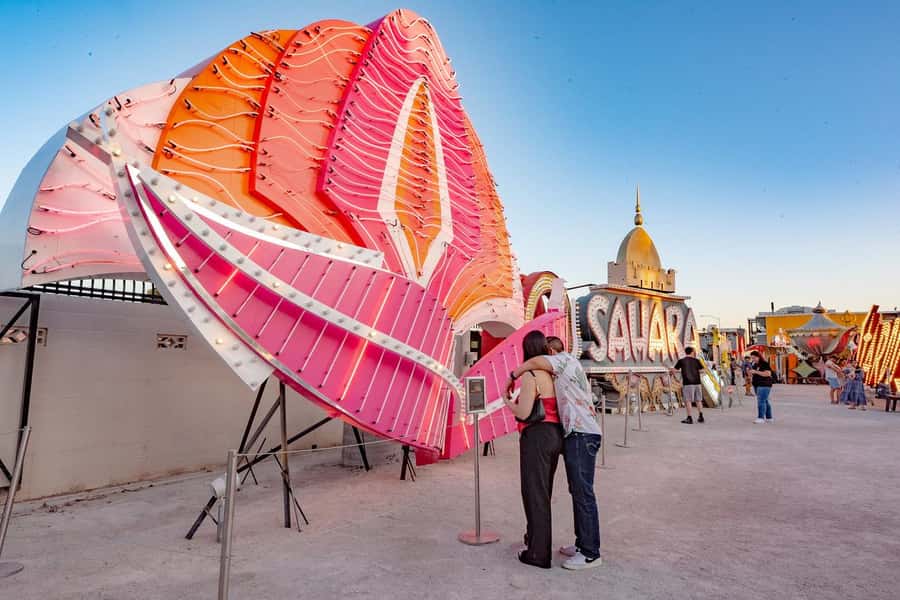 Las Vegas: Neon Museum Experience & Vegas Open-Top Bus Tour - Walking through the Neon Boneyard