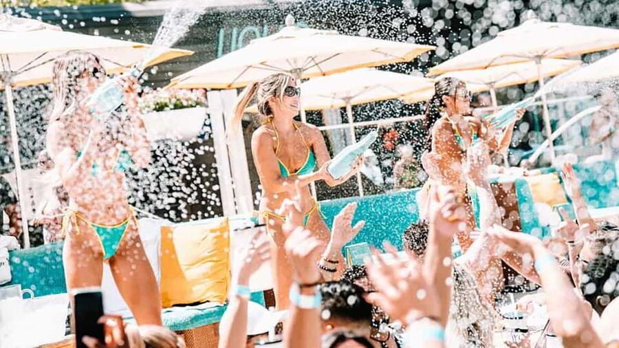 Las Vegas : Pool Crawl w/ Party Bus, Open Bar & VIP Entry - The Party Bus and Liquor Store Stop
