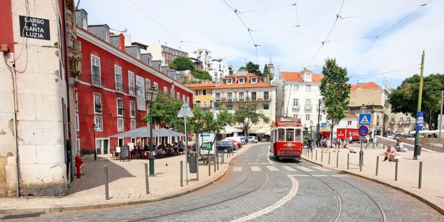 Lisbon: 3-in-1 Hop-On Hop-Off Bus and Tram Tours - Audio guides, staff, and the practical tradeoffs