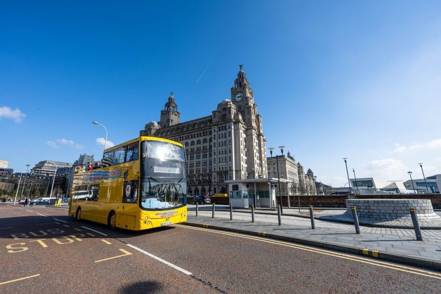 Liverpool: River Cruise and Hop-On Hop-Off Bus Tour - Taking the open-top bus around the city